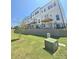 View of backyard area with multiple decks and walkout basement at 2137 Barrowcliffe Dr # 49, Concord, NC 28027