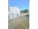 New wooden deck with white railing at 2137 Barrowcliffe Dr # 49, Concord, NC 28027