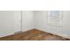 Bright bedroom with white walls features wood-look flooring and a window providing ample natural light at 2488 Catawba Church Rd, Rock Hill, SC 29730