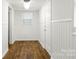 Bonus room showcasing beadboard walls, wood-look flooring, and a window for natural light at 2488 Catawba Church Rd, Rock Hill, SC 29730