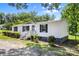 Single-story home with white siding, a well-maintained lawn, and a welcoming front porch at 2488 Catawba Church Rd, Rock Hill, SC 29730