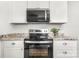 Updated kitchen with stainless steel appliances and granite countertops at 2488 Catawba Church Rd, Rock Hill, SC 29730