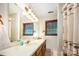 Bathroom with double sink vanity, decorative lighting, and a shower-tub combination at 2615 Highway 557 None, Clover, SC 29710