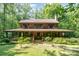 Charming two-story home with a large, inviting front porch and mature landscaping at 2615 Highway 557 None, Clover, SC 29710
