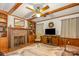 Comfortable living room featuring a brick fireplace, built-in shelves, and wood accents at 2615 Highway 557 None, Clover, SC 29710