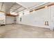 Unfinished basement space with concrete floor, exposed ceiling, and utility hookups at 265 River Run Rd, Statesville, NC 28625