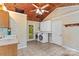Functional laundry room with sink, cabinets, washer, dryer and direct access to the outside at 265 River Run Rd, Statesville, NC 28625