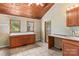 Practical mud room has tile flooring, cabinets and a sink; ideal for transitions between outside and in at 265 River Run Rd, Statesville, NC 28625