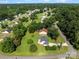 This aerial view showcases the property's large lot, mature trees and the neighborhood's proximity to nature at 2906 Plantation Way, Albemarle, NC 28001