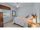 Bright bedroom with neutral walls, a ceiling fan, window with view, and a full sized bed at 2906 Plantation Way, Albemarle, NC 28001