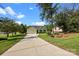 Charming single-story home featuring an attached two-car garage, complemented by a lush front lawn and long driveway at 2906 Plantation Way, Albemarle, NC 28001