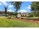 Attractive single-story home with a two-car garage, green shutters, set on a spacious lot with mature trees and landscaping at 2906 Plantation Way, Albemarle, NC 28001