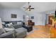 Spacious living room with vaulted ceilings, hardwood floors, and comfortable seating arrangements at 2906 Plantation Way, Albemarle, NC 28001