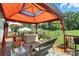 Inviting back deck area with seating, privacy, and outdoor living space at 29636 Lakeside Dr, Albemarle, NC 28001
