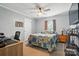 Bright bedroom featuring a comfy bed, stylish decor, and ample natural light at 29636 Lakeside Dr, Albemarle, NC 28001