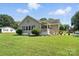 Charming single story home with a manicured lawn and inviting front porch at 29636 Lakeside Dr, Albemarle, NC 28001