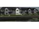 Newly constructed townhomes with neat landscaping provide modern curb appeal at 3134 Beacon Heights Rd, Indian Land, SC 29707