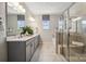 Elegant bathroom features double vanity, large shower, and a separate tub at 3136 Beacon Heights Rd, Indian Land, SC 29707