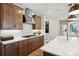 Modern kitchen with sleek cabinetry, stainless steel appliances, and a stylish range hood at 327 Ardmore Dr, Belmont, NC 28012