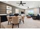 The spacious living room has a dining area and comfortable couches at 327 Ardmore Dr, Belmont, NC 28012