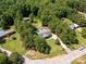 Aerial view showcasing an expansive yard, pool, shed, mature trees, and a long driveway at 4030 Orion Rd, York, SC 29745