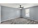 Carpeted bedroom with ceiling fan and a window at 4030 Orion Rd, York, SC 29745