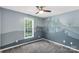 Bedroom with neutral carpet and a castle wall mural at 4030 Orion Rd, York, SC 29745