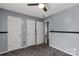 Neutral bedroom featuring plush carpeting, a ceiling fan, and access to ample closet space at 4030 Orion Rd, York, SC 29745