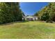 Well-maintained home with a spacious front yard and mature trees at 4030 Orion Rd, York, SC 29745
