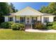 Charming home featuring a cozy front porch with lovely landscaping at 4030 Orion Rd, York, SC 29745