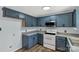 Well-lit kitchen with stainless steel appliances and ample counter space at 4030 Orion Rd, York, SC 29745