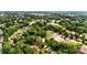 Aerial view of neighborhood featuring treed lots, and home in a tranquil surrounding at 450 1St Se St, Hickory, NC 28602