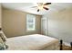 Bedroom with neutral walls, hardwood floors, and a comfortable queen sized bed at 450 1St Se St, Hickory, NC 28602