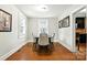 Cozy dining room with seating for four and a view into the kitchen at 450 1St Se St, Hickory, NC 28602