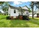 Exterior view of a home, featuring well-maintained lawn, landscaping, and a charming porch at 450 1St Se St, Hickory, NC 28602