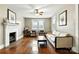 Bright living room with hardwood floors, fireplace, and ample natural light at 450 1St Se St, Hickory, NC 28602