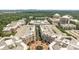A birds-eye view capturing a vibrant community layout with stunning buildings and lush landscaping at 4625 Piedmont Row Dr, Charlotte, NC 28210