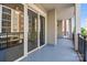 Large balcony with sliding glass doors overlooking the exterior at 4625 Piedmont Row Dr, Charlotte, NC 28210
