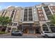Building exterior showcases stylish architecture with visible businesses like Woodhouse Spa, and Loft at 4625 Piedmont Row Dr, Charlotte, NC 28210