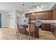 Open kitchen concept with stainless steel appliances, kitchen island, and lots of cabinet space at 4625 Piedmont Row Dr, Charlotte, NC 28210