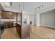 Modern kitchen featuring a kitchen island with pendant lighting and stainless steel appliances at 4625 Piedmont Row Dr, Charlotte, NC 28210