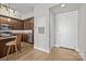 Entryway of home featuring small kitchen with stainless steel appliances and granite counters at 4625 Piedmont Row Dr, Charlotte, NC 28210