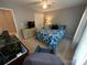 Inviting bedroom with a blue floral comforter and coordinating pillows at 5024 Ardenwoods Dr, Charlotte, NC 28215
