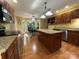 Spacious kitchen featuring granite countertops, stainless steel appliances, and an island at 5024 Ardenwoods Dr, Charlotte, NC 28215