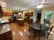 Well-lit kitchen with a center island, wooden cabinetry, and stainless steel appliances at 5024 Ardenwoods Dr, Charlotte, NC 28215