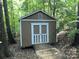 Shed with a ramp and double doors at 5024 Ardenwoods Dr, Charlotte, NC 28215