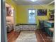 Open dining area features breakfast bar and window seating, with hardwood flooring at 508 E Rice St, Landis, NC 28088