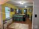 Spacious kitchen with an island, butcher block countertops, unique cabinetry, and modern appliances at 508 E Rice St, Landis, NC 28088