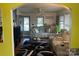 View of living room with hardwood flooring and connecting to dining room at 508 E Rice St, Landis, NC 28088