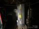 Basement showcasing the water heater for the home with energy guide at 508 E Rice St, Landis, NC 28088